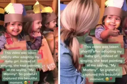 Pas geadopteerd meisje kan ogen niet van moeder afhouden tijdens schooloptreden